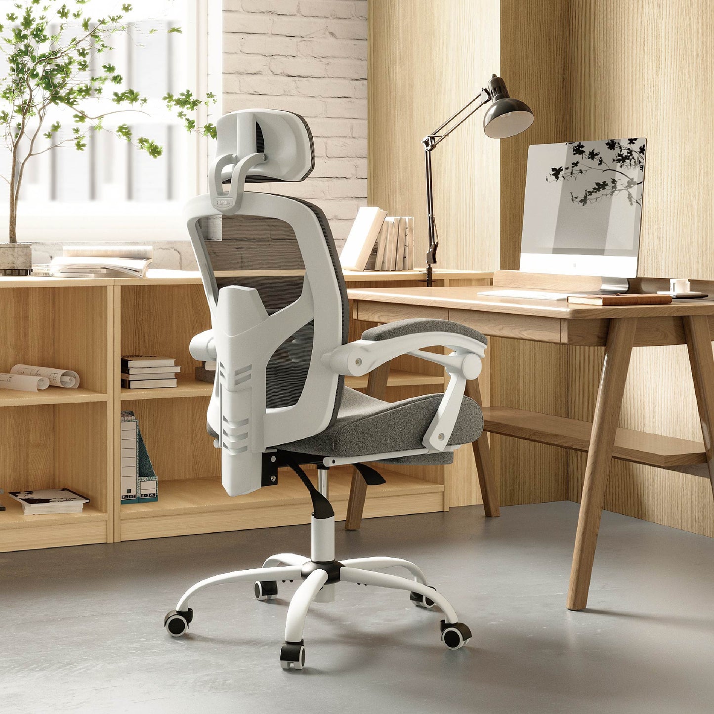 Retractable Footrest Ergonomic Swivel Office Chair with Lumbar Support Pillow and Padded Armrests